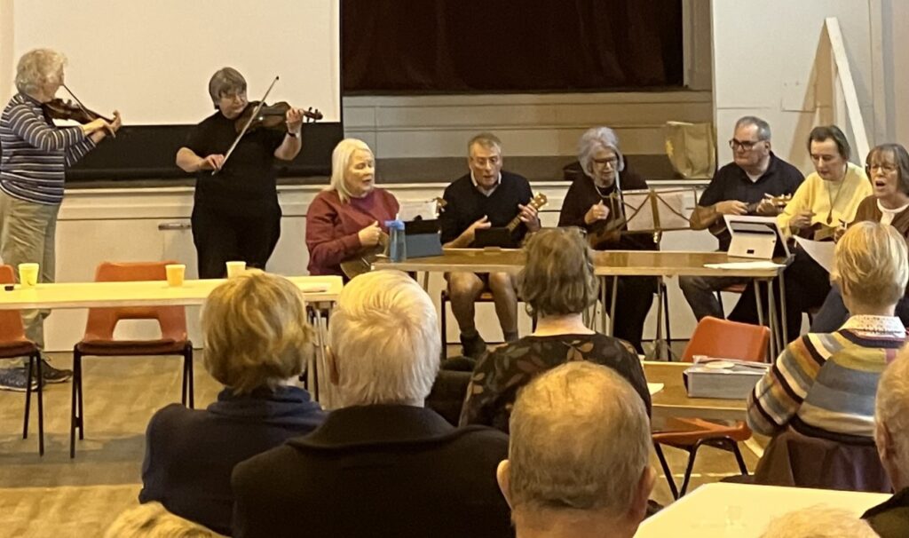 A photo of the musicians at our Burns social event