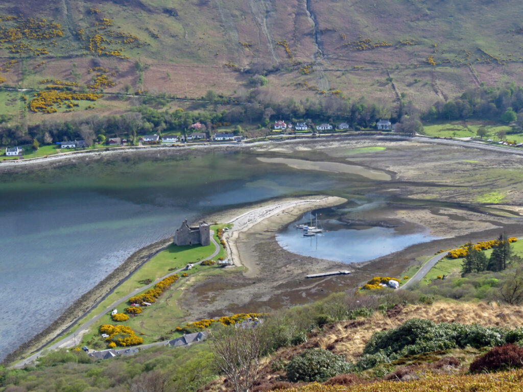 A photo of Lochranza bay and castle, taken from a hill above the village.